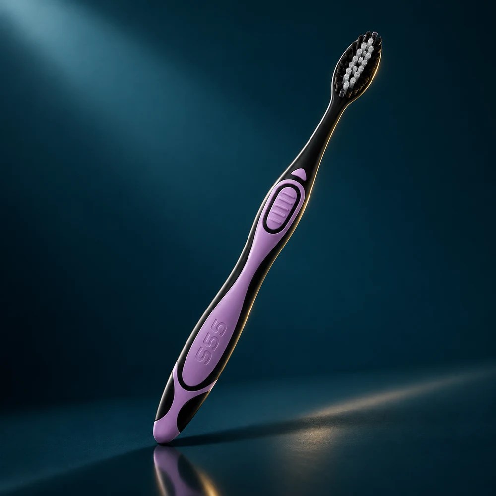 Black and lilac 5Doctors toothbrush lit against a dark background